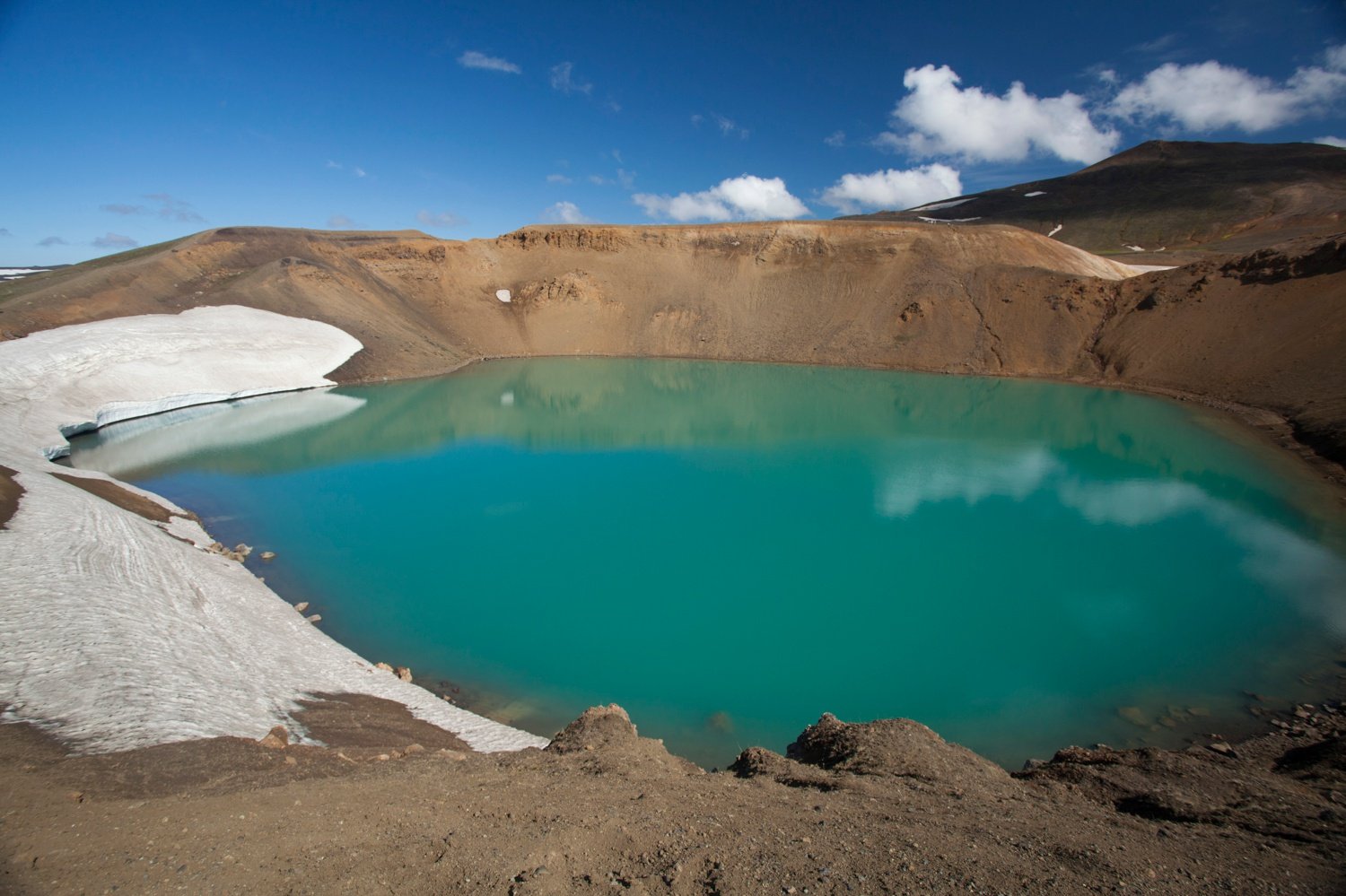 A turquoise pool fills Viti crater, Krafla volcanic area, Myvatn, Nordhurland Eystra, Iceland. A turquoise pool fills Viti crater, Krafla volcanic area, Myvatn, Nordhurland Eystra, Iceland.