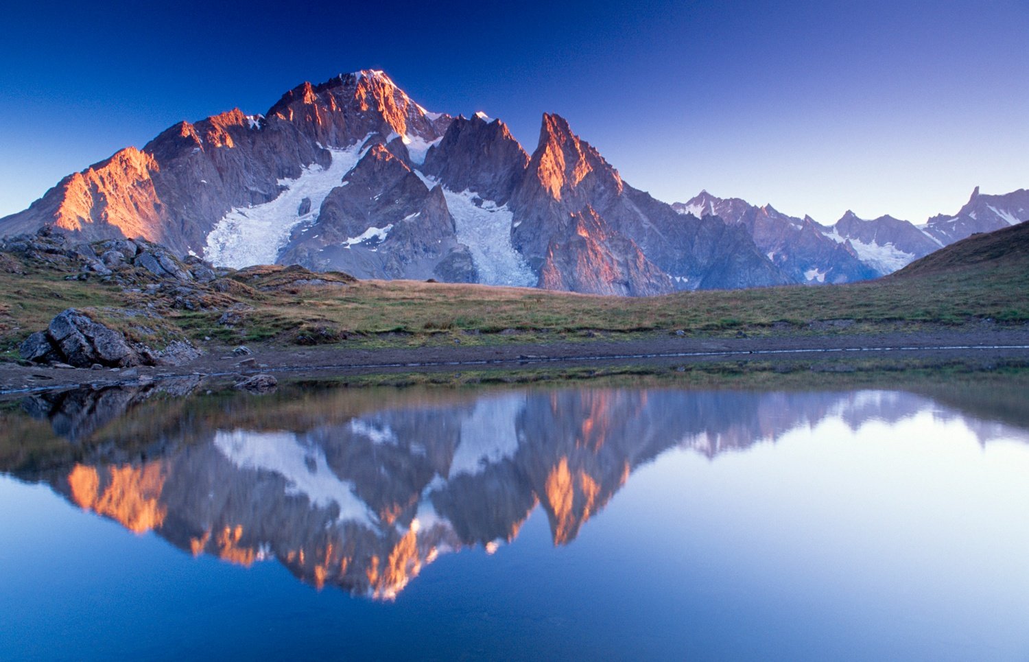 Dawn reflection of Mont Blanc, Val Veni, Tour of Mont Blanc, Italian Alps, Italy. Dawn reflection of Mont Blanc, Val Veni, Tour of Mont Blanc, Italian Alps, Italy.