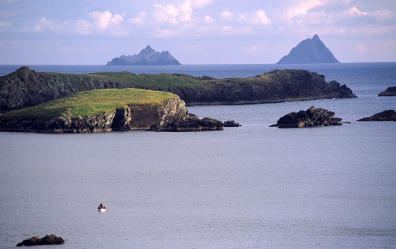 Fishing boat in front of the Skellig Islands, Co Kerry, Ireland.