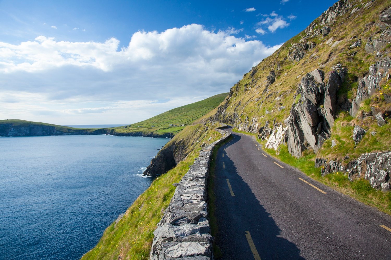 Coast road around Slea Head, Dingle Peninsula, County Kerry, Ireland. Coast road around Slea Head, Dingle Peninsula, County Kerry, Ireland.