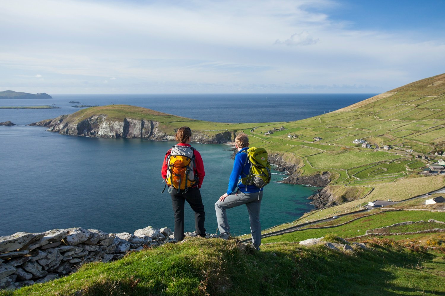 Walkers on the Dingle Way above Slea Head, Dingle Peninsula, County Kerry, Ireland. Walkers on the Dingle Way above Slea Head, Dingle Peninsula, County Kerry, Ireland.