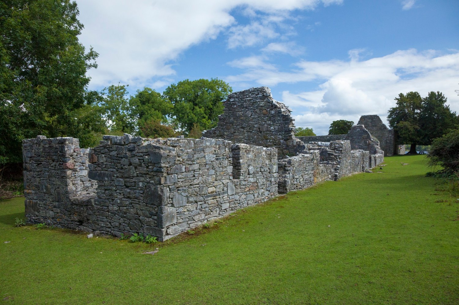 Ruined monastery on Innishfallen Island, Killarney National Park, County Kerry, Ireland. Ruined monastery on Innishfallen Island, Killarney National Park, County Kerry, Ireland.