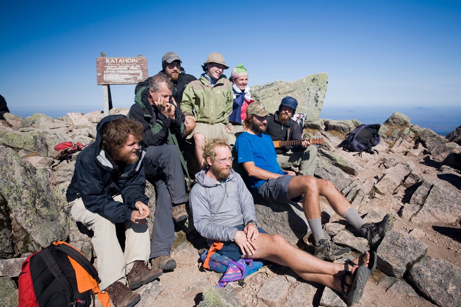 Hikers at the summit of Mt Katadhin, Baxter State Park, Maine, USA. Hikers at the summit of Mt Katadhin, Baxter State Park, Maine, USA.