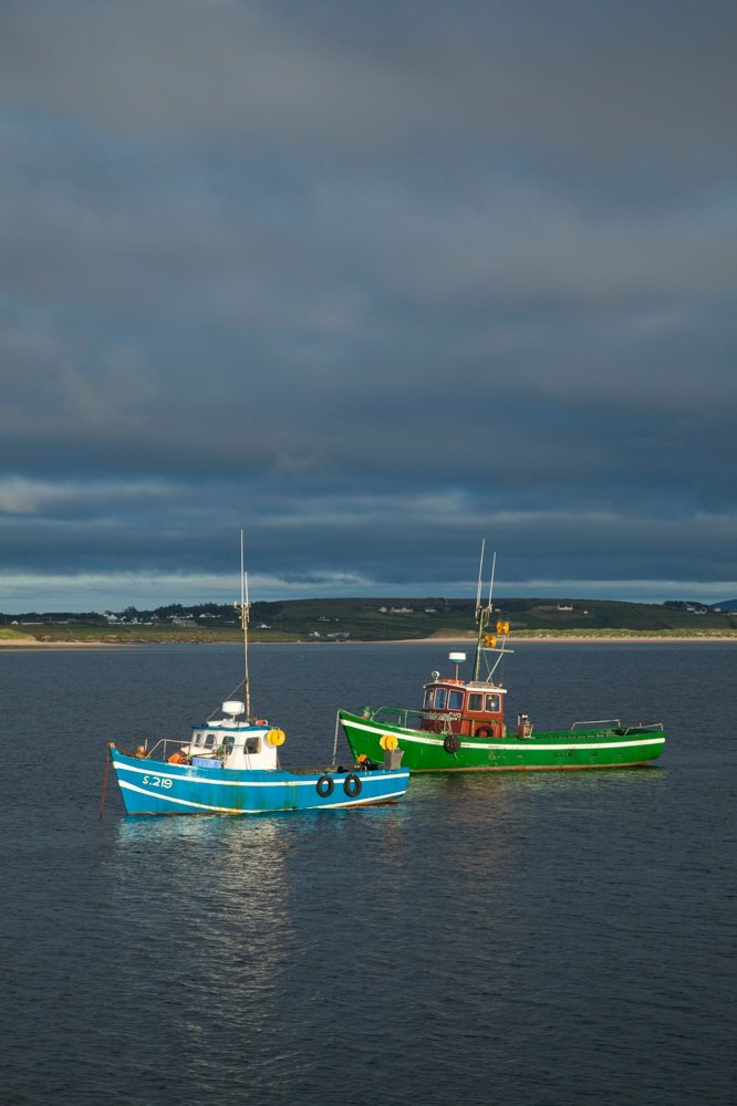 Fishing boats moored in Broadhaven Bay, Carrowteige, Co Mayo, Ireland.