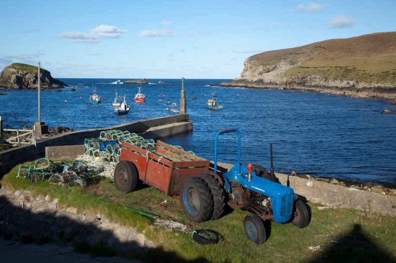 Old tractor beside Porturlin Harbour, Co Mayo, Ireland.