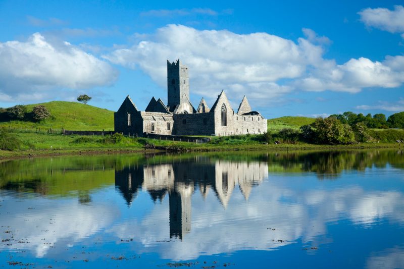 Reflection of Rosserk Abbey in the River Moy, County Mayo, Ireland.