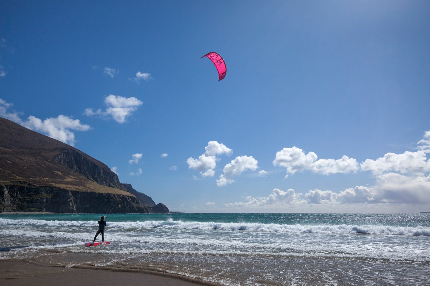 Sophie Mathews kitesurfing Keel Strand, Achill Island, County Mayo, Ireland. Sophie Mathews kitesurfing Keel Strand, Achill Island, County Mayo, Ireland.