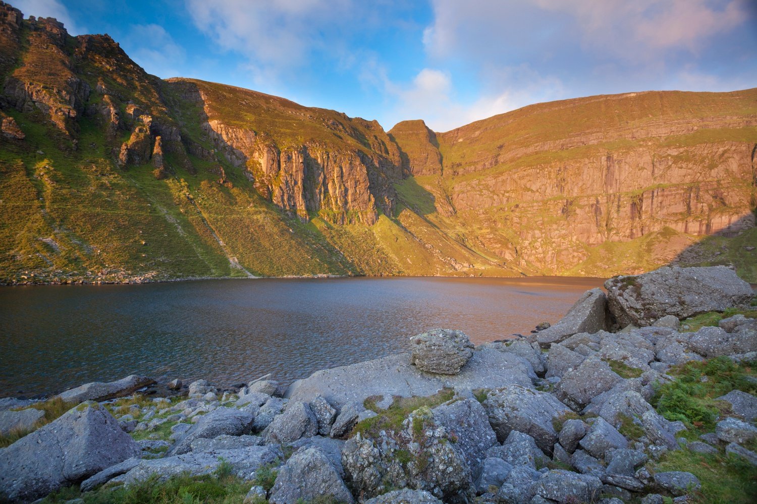 Dawn light illuminates Coumshingaun, Comeragh Mountains, County Waterford, Ireland. Dawn light illuminates Coumshingaun, Comeragh Mountains, County Waterford, Ireland.