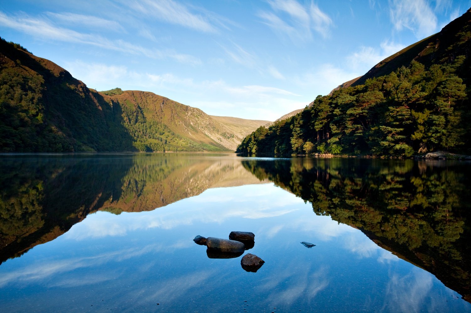 Morning reflections in Upper Lake, Glendalough, Co Wicklow, Ireland. Morning reflections in Upper Lake, Glendalough, Co Wicklow, Ireland.