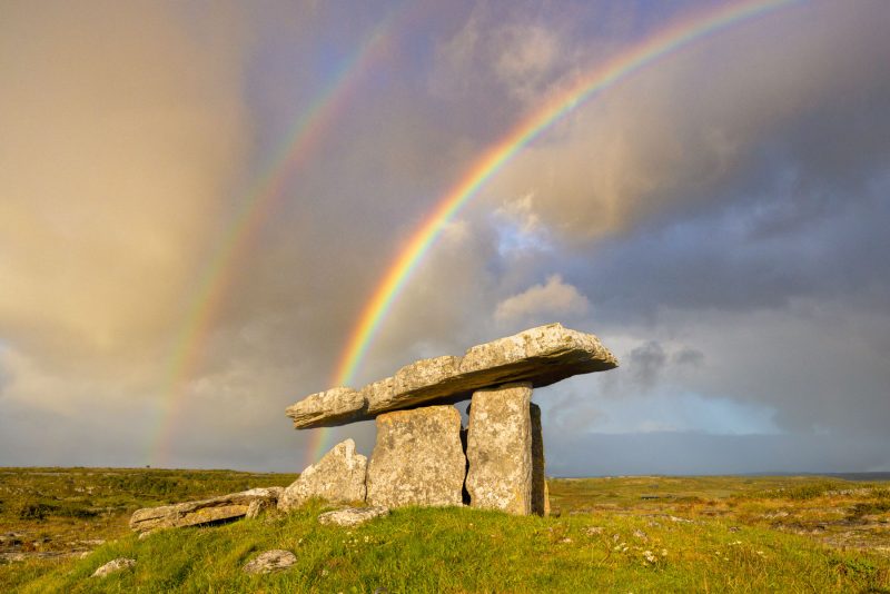 Rainbow, Polnabrone Dolmen, the Burren, County Clare, Ireland.