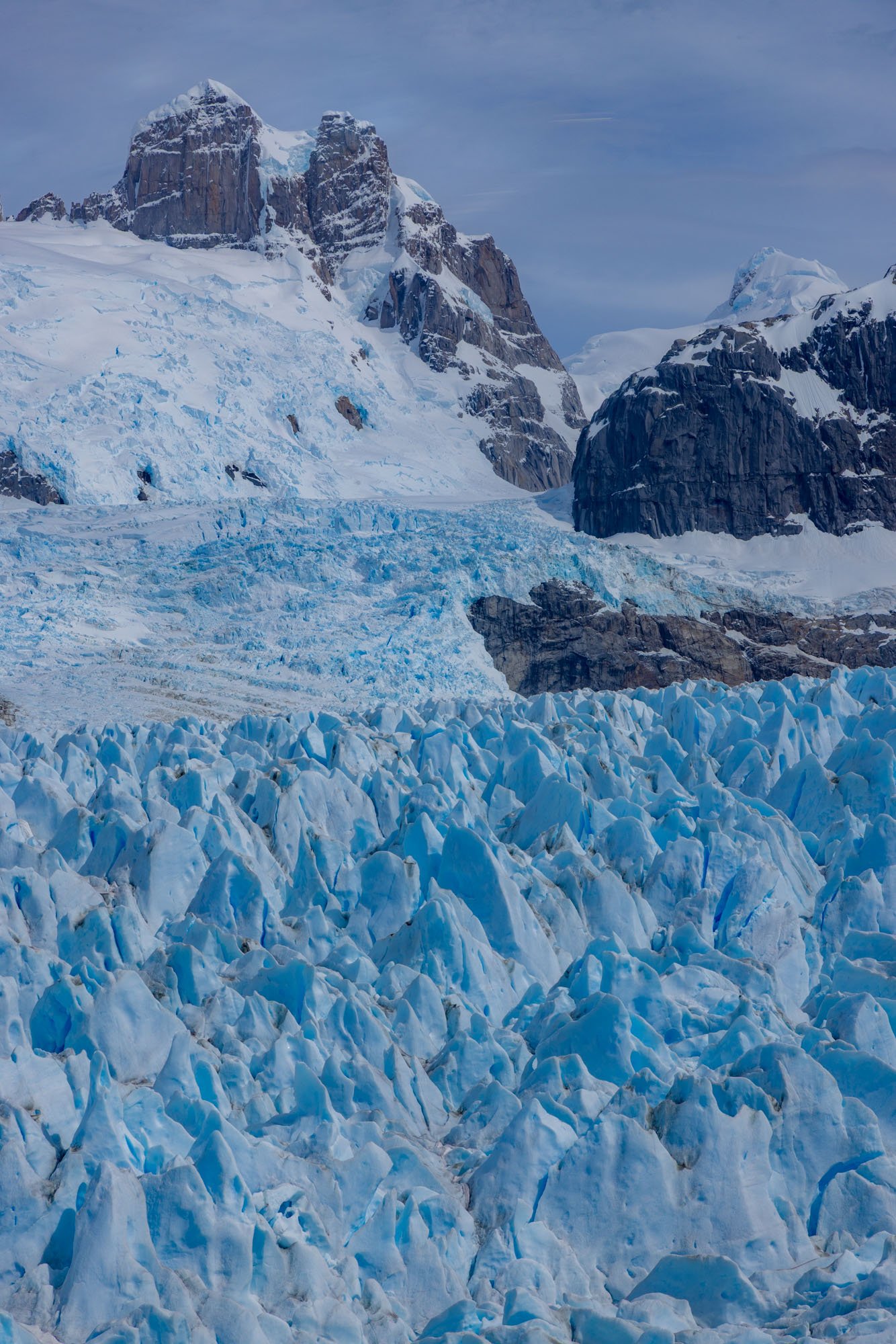 Cerro Gargantua and the crevasses of the Nef Glacier, Northern Patagonian Icefield, Laguna San Rafael National Park, Patagonia, Chile. Cerro Gargantua and the crevasses of the Nef Glacier, Northern Patagonian Icefield, Laguna San Rafael National Park, Patagonia, Chile.