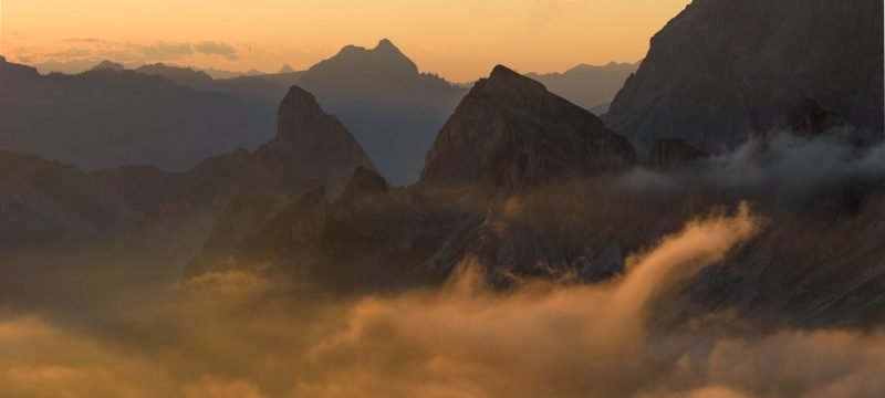 Evening mists around Pass Giau, Dolomites, Italy.